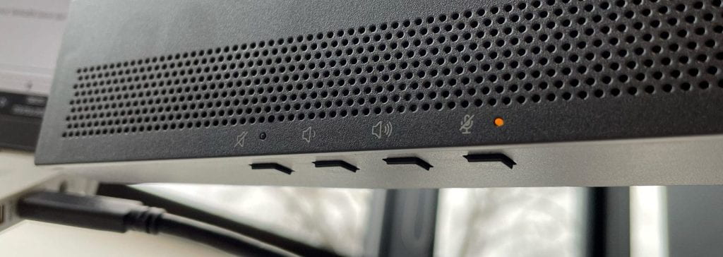 A picture of the left underside of a HP E34m G4 wide monitor, showing the sound settings buttons.